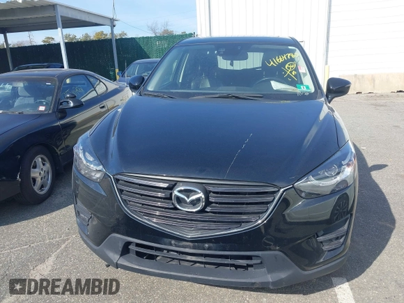 2016 Mazda CX-5 Grand Touring with VIN JM3KE4DY5G0681436, listed as a IAAI auction lot 41664780 with 172,199 mi miles. Bid and sale history available at carsss.com. Image 12.