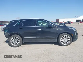 2017 Cadillac XT5 Platinum AWD z VIN 1GYKNFRS7HZ103127, wystawiony jako IAAI lot #41830037 z przebiegiem 82 480 mil mil oraz . Historia ofert i sprzedaży dostępna na DreamBid. Obrazek 14.
