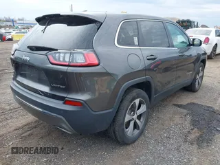 2019 Jeep Cherokee Limited with VIN 1C4PJMDX6KD156310, listed as a IAAI auction lot 41982999 with 52,000 mi miles. Bid and sale history available at carsss.com. Image 4.