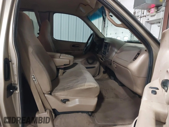 1999 Ford F-150 with VIN 1FTRX18W0XKA68363, listed as a IAAI auction lot 41524104 with 218,400 mi miles and . Bid and sale history available at DreamBid. Image 5.
