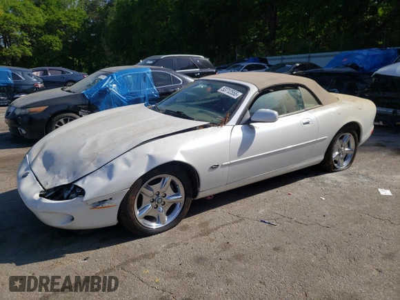 1999 Jaguar XK with VIN SAJGX2043XC040866, listed as a Copart auction lot 53712555 with 65,349 mi miles and Clean Title. Bid and sale history available at DreamBid. Image 1.