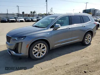 2020 Cadillac XT6 FWD Premium Luxury with VIN 1GYKPCRS5LZ201302, listed as a Copart auction lot 55103225 with 61,527 mi miles and Salvage Title. Bid and sale history available at carsss.com. Image 1.