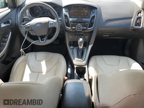 2015 Ford Focus Titanium с VIN 1FADP3N24FL214429, выставлен на аукционе Copart как лот 59159075 с пробегом 157 353 миль миль и Списание • Salvage title. История ставок и продаж доступна на DreamBid. Изображение 8.