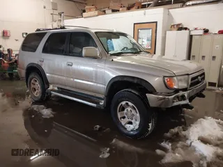 1998 Toyota 4Runner SR5 with VIN JT3HN86R1W0183463, listed as a IAAI auction lot 41515690 with 299,355 mi miles and . Bid and sale history available at DreamBid. Image 1.