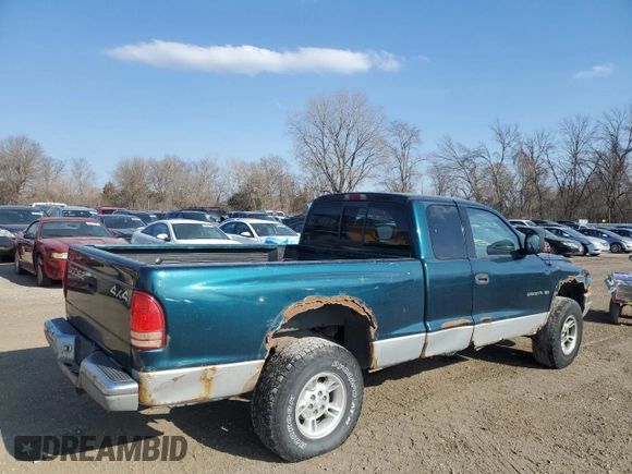 1997 Dodge Dakota z VIN 1B7GG23Y6VS264634, wystawiony jako Copart lot #50611355 z przebiegiem 221 823 mil mil oraz Szkoda całkowita • Salvage title. Historia ofert i sprzedaży dostępna na DreamBid. Obrazek 3.