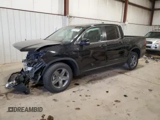 2021 Honda Ridgeline RTL z VIN 5FPYK3F53MB026043, wystawiony jako Copart lot #83155534 z przebiegiem Nie podano mil oraz Szkoda całkowita • Salvage title. Historia ofert i sprzedaży dostępna na DreamBid. Obrazek 1.