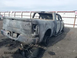 2012 Ram 2500 Laramie Longhorn with VIN 3C6UD5GLXCG285008, listed as a IAAI auction lot 41450250 with Not Provided miles. Bid and sale history available at carsss.com. Image 4.