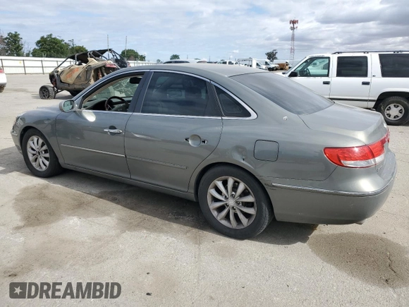 2006 Hyundai Azera SE z VIN KMHFC46F76A054625, wystawiony jako Copart lot #56588315 z przebiegiem 178 667 mil mil oraz Szkoda całkowita • Salvage title. Historia ofert i sprzedaży dostępna na DreamBid. Obrazek 2.