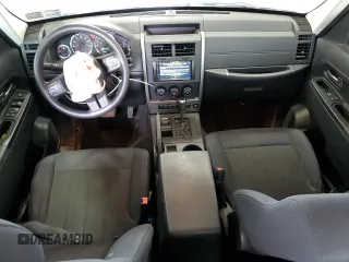 2012 Jeep Liberty Sport z VIN 1C4PJMAK9CW129035, wystawiony jako Copart lot #57905335 z przebiegiem 137 701 mil mil oraz Szkoda całkowita • Salvage title. Historia ofert i sprzedaży dostępna na DreamBid. Obrazek 8.