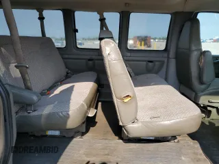 2004 Chevrolet Express Passenger with VIN 1GAHG39U741128458, listed as a Copart auction lot 64436215 with 118,387 mi miles and Salvage title. Bid and sale history available at DreamBid. Image 11.