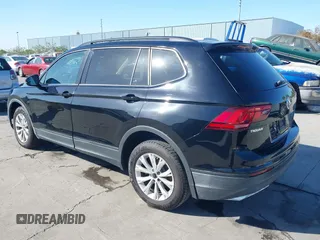 2018 Volkswagen Tiguan S with VIN 3VV1B7AX1JM091928, listed as a IAAI auction lot 42283454 with 53,650 mi miles and . Bid and sale history available at DreamBid. Image 3.