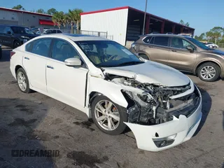 2015 Nissan Altima SL z VIN 1N4AL3AP1FC430528, wystawiony jako IAAI lot #41945494 z przebiegiem 130 059 mil mil oraz . Historia ofert i sprzedaży dostępna na DreamBid. Obrazek 1.