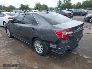2013 Toyota Camry Hybrid LE with VIN 4T1BD1FK1DU091687, listed as a IAAI auction lot 42046450 with 211,895 mi miles. Bid and sale history available at carsss.com. Image 3.