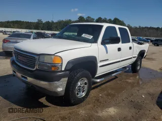 2002 GMC Sierra 2500HD SLE with VIN 1GTHC23U32F104194, listed as a Copart auction lot 75814434 with 131,330 mi miles and Salvage title. Bid and sale history available at DreamBid. Image 1.