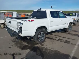 2017 Toyota Tacoma SR5 with VIN 5TFCZ5AN0HX077402, listed as a IAAI auction lot 41603762 with 118,257 mi miles and . Bid and sale history available at DreamBid. Image 4.