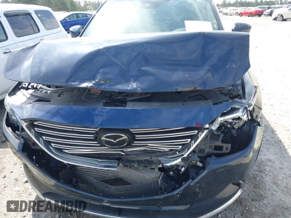 2022 Mazda CX-9 Grand Touring with VIN JM3TCBDY0N0625223, listed as a IAAI auction lot 41811019 with 34,982 mi miles. Bid and sale history available at carsss.com. Image 19.