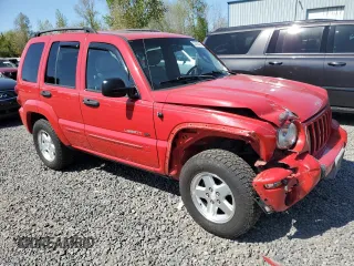 2002 Jeep Liberty Limited with VIN 1J8GL58K42W328443, listed as a Copart auction lot 52768345 with 218,459 mi miles and Salvage title. Bid and sale history available at DreamBid. Image 4.