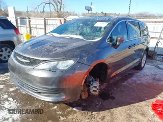 2017 Chrysler Pacifica Touring with VIN 2C4RC1DG7HR648786, listed as a IAAI auction lot 41570029 with 125,406 mi miles and . Bid and sale history available at DreamBid. Image 2.