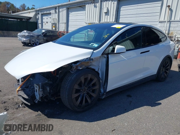 2022 Tesla Model X with VIN 7SAXCDE58NF342776, listed as a IAAI auction lot 42042369 with 70,301 mi miles and . Bid and sale history available at DreamBid. Image 23.