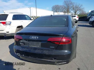 2017 Audi A8 with VIN WAU44AFD0HN017821, listed as a IAAI auction lot 41676097 with 107,378 mi miles and . Bid and sale history available at DreamBid. Image 16.