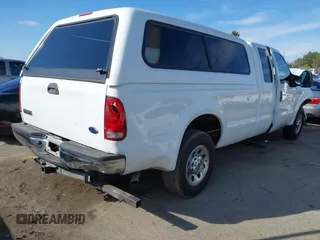 2005 Ford Super Duty F-250 XL with VIN 1FTSX20Y05EB83349, listed as a IAAI auction lot 41433254 with 169,933 mi miles. Bid and sale history available at carsss.com. Image 4.