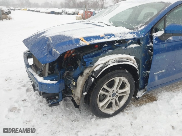 2018 Ford Fusion Hybrid S with VIN 3FA6P0UU8JR122342, listed as a IAAI auction lot 41355323 with 85,304 mi miles. Bid and sale history available at carsss.com. Image 6.