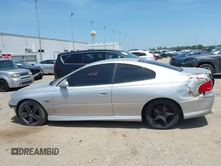 2004 Pontiac GTO z VIN 6G2VX12G04L295369, wystawiony jako IAAI lot #42244826 z przebiegiem Nie podano mil oraz . Historia ofert i sprzedaży dostępna na DreamBid. Obrazek 13.