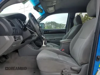 2009 Toyota Tacoma PreRunner with VIN 3TMJU62N99M082065, listed as a Copart auction lot 50783825 with 259,413 mi miles and Salvage title. Bid and sale history available at DreamBid. Image 7.