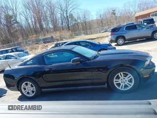 2011 Ford Mustang V6 with VIN 1ZVBP8AM2B5153163, listed as a IAAI auction lot 41645917 with 286,609 mi miles and . Bid and sale history available at carsss.com. Image 14.