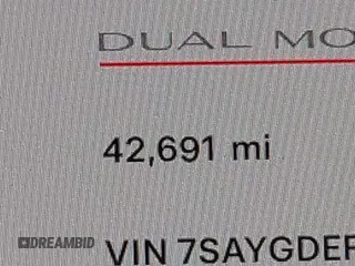 2023 Tesla Model Y Performance z VIN 7SAYGDEF7PF663387, wystawiony jako IAAI lot #42129258 z przebiegiem 42 691 mil mil oraz . Historia ofert i sprzedaży dostępna na DreamBid. Obrazek 16.