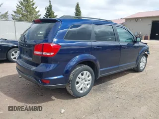 2019 Dodge Journey SE with VIN 3C4PDCBBXKT707700, listed as a IAAI auction lot 42038474 with 57,903 mi miles and . Bid and sale history available at DreamBid. Image 4.