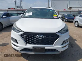 2019 Hyundai Tucson Sport with VIN KM8J33AL1KU861698, listed as a IAAI auction lot 42129173 with 100,160 mi miles. Bid and sale history available at carsss.com. Image 12.