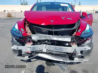 2021 Tesla Model Y Performance with VIN 5YJYGDEF4MF092062, listed as a IAAI auction lot 41583793 with 57,194 mi miles and . Bid and sale history available at DreamBid. Image 6.