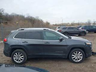 2016 Jeep Cherokee Limited z VIN 1C4PJMDBXGW170596, wystawiony jako IAAI lot #41821900 z przebiegiem 138 593 mil mil oraz . Historia ofert i sprzedaży dostępna na DreamBid. Obrazek 13.