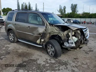 2010 Honda Pilot Touring with VIN 5FNYF3H81AB016255, listed as a Copart auction lot 71052644 with 96,847 mi miles and Salvage Title. Bid and sale history available at DreamBid. Image 4.