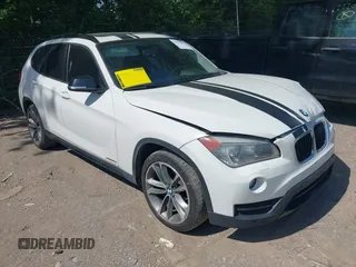 2014 BMW X1 xDrive28i z VIN WBAVL1C53EVY11650, wystawiony jako IAAI lot #42271922 z przebiegiem 106 402 mil mil oraz . Historia ofert i sprzedaży dostępna na DreamBid. Obrazek 1.