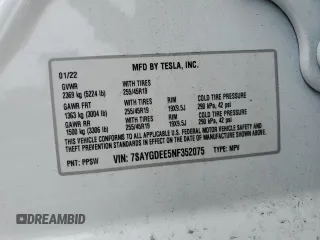2022 Tesla Model Y Long Range z VIN 7SAYGDEE5NF352075, wystawiony jako Copart lot #50799895 z przebiegiem 11 597 mil mil oraz Szkoda całkowita • Salvage title. Historia ofert i sprzedaży dostępna na DreamBid. Obrazek 13.
