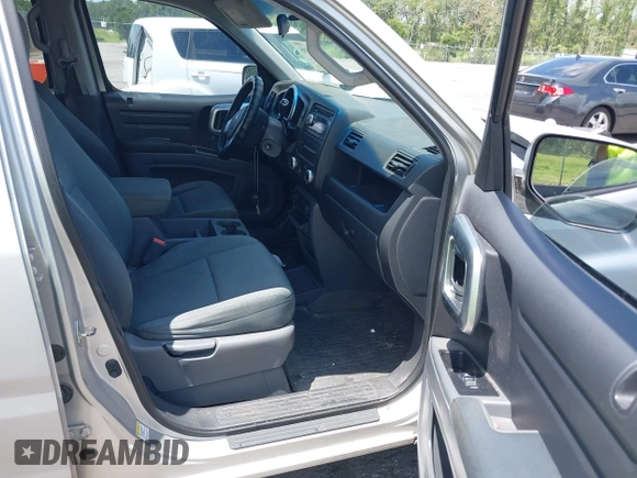 2008 Honda Ridgeline RT with VIN 2HJYK16228H524622, listed as a IAAI auction lot 42445595 with 209,649 mi miles and . Bid and sale history available at DreamBid. Image 5.