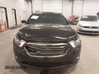 2015 Ford Taurus SEL with VIN 1FAHP2H80FG133240, listed as a IAAI auction lot 41897873 with 189,059 mi miles. Bid and sale history available at carsss.com. Image 12.