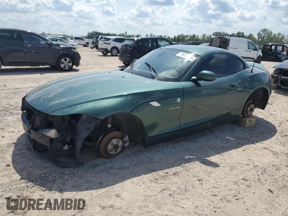 2011 BMW Z4 sDrive30i with VIN WBALM5C55BE495921, listed as a Copart auction lot 71453304 with 116,136 mi miles and Salvage Title. Bid and sale history available at carsss.com. Image 1.
