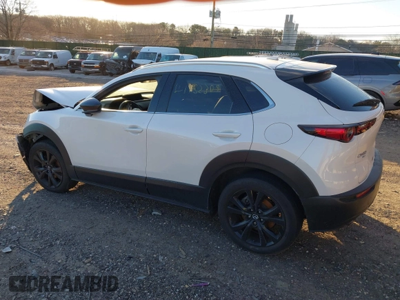 2021 Mazda CX-30 Premium with VIN 3MVDMBDY2MM236118, listed as a IAAI auction lot 41182309 with 32,286 mi miles and . Bid and sale history available at carsss.com. Image 3.