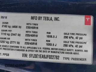 2018 Tesla Model 3 Long Range Battery with VIN 5YJ3E1EA9JF022782, listed as a IAAI auction lot 41875429 with 79,209 mi miles. Bid and sale history available at carsss.com. Image 9.