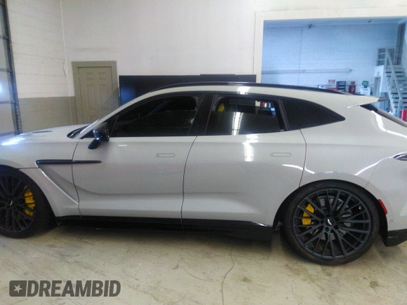 2023 Aston Martin DBX 707 z VIN SD7VUJBW2PTV05712, wystawiony jako IAAI lot #40673188 z przebiegiem 4702 mil mil oraz . Historia ofert i sprzedaży dostępna na DreamBid. Obrazek 15.