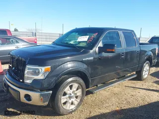 2013 Ford F-150 XL with VIN 1FTFW1CF2DKG35259, listed as a IAAI auction lot 41834796 with 131,817 mi miles. Bid and sale history available at carsss.com. Image 2.