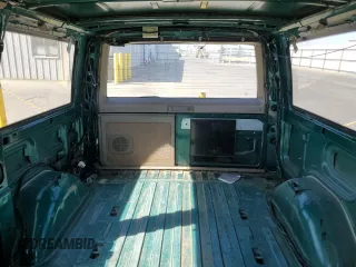 1998 GMC Safari with VIN 1GKEL19W6WB525088, listed as a Copart auction lot 67982664 with 163,182 mi miles and Salvage Title. Bid and sale history available at carsss.com. Image 10.
