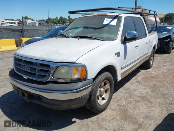 2001 Ford F-150 XLT with VIN 1FTRW07W21KE19926, listed as a IAAI auction lot 42750523 with Not provided miles and . Bid and sale history available at DreamBid. Image 2.