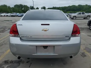 2014 Chevrolet Impala LT with VIN 2G1WB5E34E1161895, listed as a Copart auction lot 58414845 with 127,373 mi miles and Salvage title. Bid and sale history available at DreamBid. Image 6.