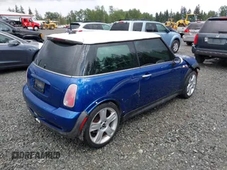 2003 MINI Hardtop S z VIN WMWRE33433TD60388, wystawiony jako IAAI lot #42313209 z przebiegiem 125 869 mil mil oraz . Historia ofert i sprzedaży dostępna na DreamBid. Obrazek 4.