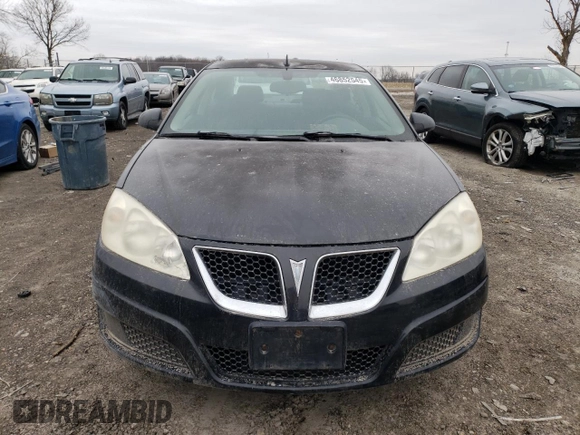 2010 Pontiac G6 1SB z VIN 1G2ZA5E09A4119917, wystawiony jako Copart lot #46852545 z przebiegiem 155 996 mil mil oraz Szkoda całkowita • Salvage title. Historia ofert i sprzedaży dostępna na DreamBid. Obrazek 5.