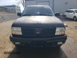 2000 Oldsmobile Bravada z VIN 1GHDT13W3Y2178106, wystawiony jako Copart lot #85069954 z przebiegiem 211 164 mil mil oraz Szkody całkowita. Historia ofert i sprzedaży dostępna na DreamBid. Obrazek 5.
